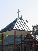 The steeple went up on June 23, 2003