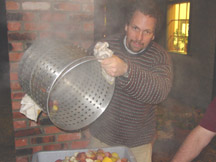 Father Frank dumps the low country boil