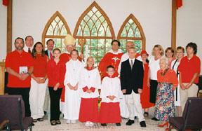 Persons confirmed or reaffirming their faith with the Bishop and servers