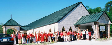 some of the 153 people present in fromt of the church