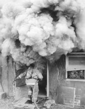 Frank's photo of a firefighter going into a house fire