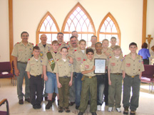Group photo of our scouts in church