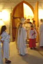 Coming out to begin the service