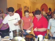 Martha serves soup for the Agape meal